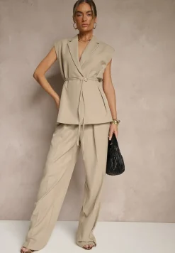 Beżowa Kamizelka Garniturowa z Usztywnianymi Ramionami Ozdobiona Wiązaniem Dannelia