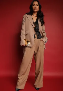 Beżowa Marynarka o Kroju Oversize z Napisami na Rękawach Hennaia