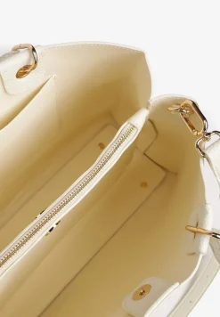 Beżowa Torebka z Regulowanym Paskiem i Metaliczną Ozdobą Isarina