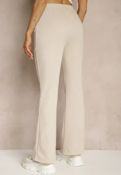 Beżowe Dresowe Spodnie Flare z Gumką w Pasie Efranaria