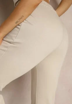 Beżowe Dresowe Spodnie Flare z Gumką w Pasie Efranaria