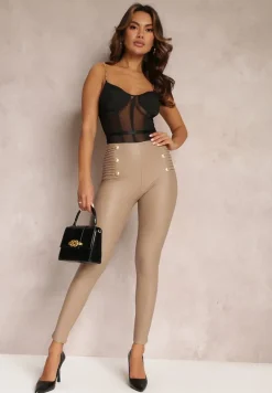 Beżowe Legginsy z Imitacji Skóry Ozdobione Drapowaniem i Napami Syah