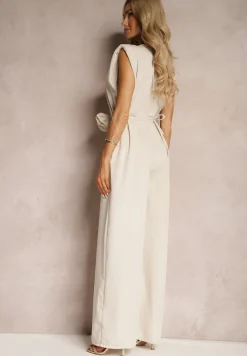 Beżowy Kombinezon Wykończony Prostymi Szerokimi Nogawkami z Wiskozą i Kwiatem 3D Dimentia