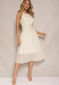 Jasnobeżowa Sukienka o Rozkloszowanym Kroju z Wiązaniem Zdobiona Tłoczeniem Nimirelle