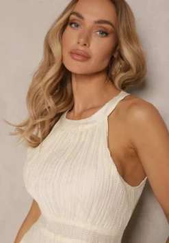 Jasnobeżowa Sukienka o Rozkloszowanym Kroju z Wiązaniem Zdobiona Tłoczeniem Nimirelle