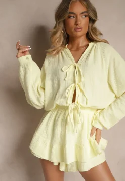 Żółty Kombinezon z Bawełny Ozdobiony Wiązaniem i Falbankami Nalelia