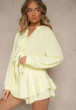 Żółty Kombinezon z Bawełny Ozdobiony Wiązaniem i Falbankami Nalelia