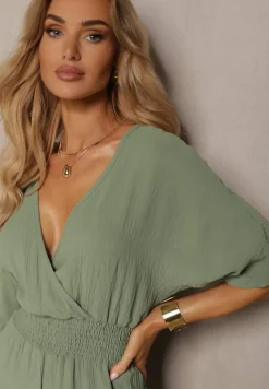 Zielony Kombinezon o Kopertowym Fasonie z Szerokim Luźnym Dołem i Kieszeniami Octoni