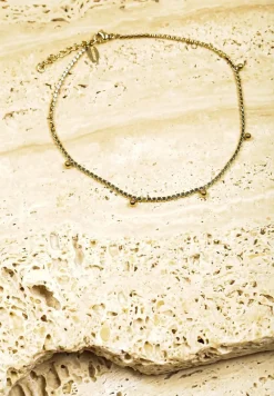 Złota Bransoletka Ozdobiona Kuleczkami i Cyrkoniami Finanela