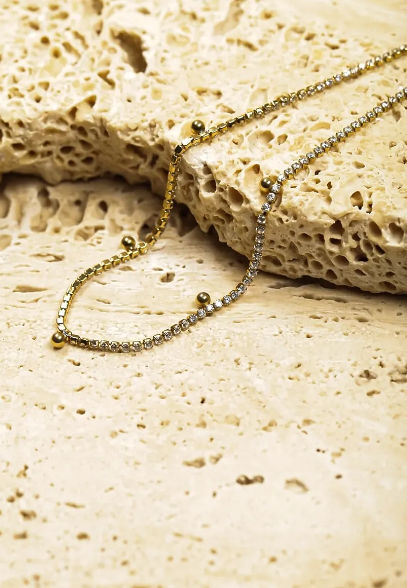 Złota Bransoletka Ozdobiona Kuleczkami i Cyrkoniami Finanela