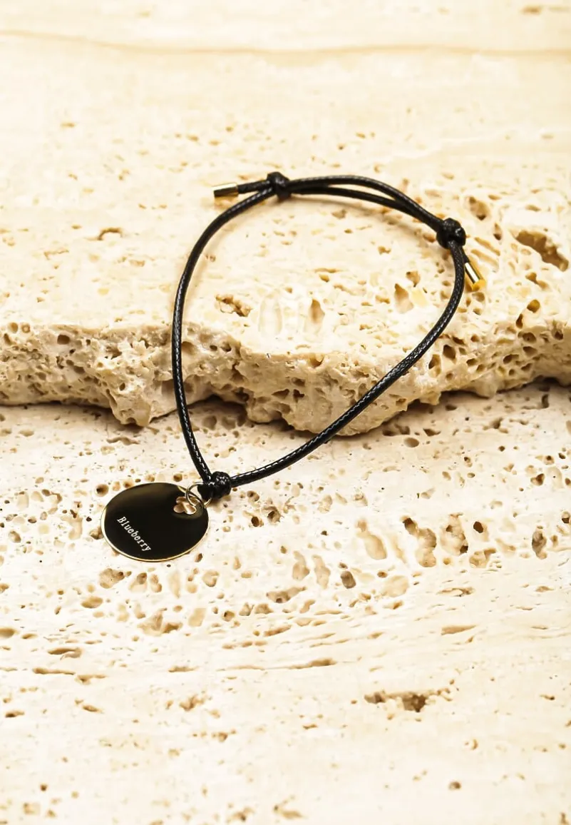 Złota Bransoletka Sznurek z Ozdobnym Napisem Clelira