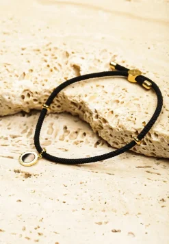 Złota Bransoletka Sznurek Ozdobiona Metalicznymi Aplikacjami Irrasene