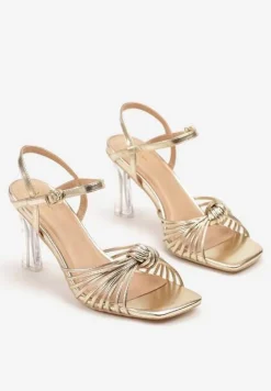 Złote Sandały Vices na Transparentnym Słupku z Supełkiem Saradina
